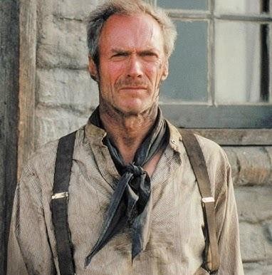 Clint Eastwood na planie filmowym, w akcji jako reżyser lub aktor, ukazujący jego pasję do kina.